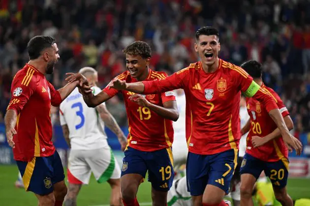 Spain celebrate their winning goal against Italy