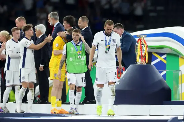 England players collect their runners up medals