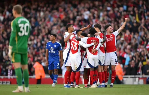 Arsenal celebrate winning against Leicester