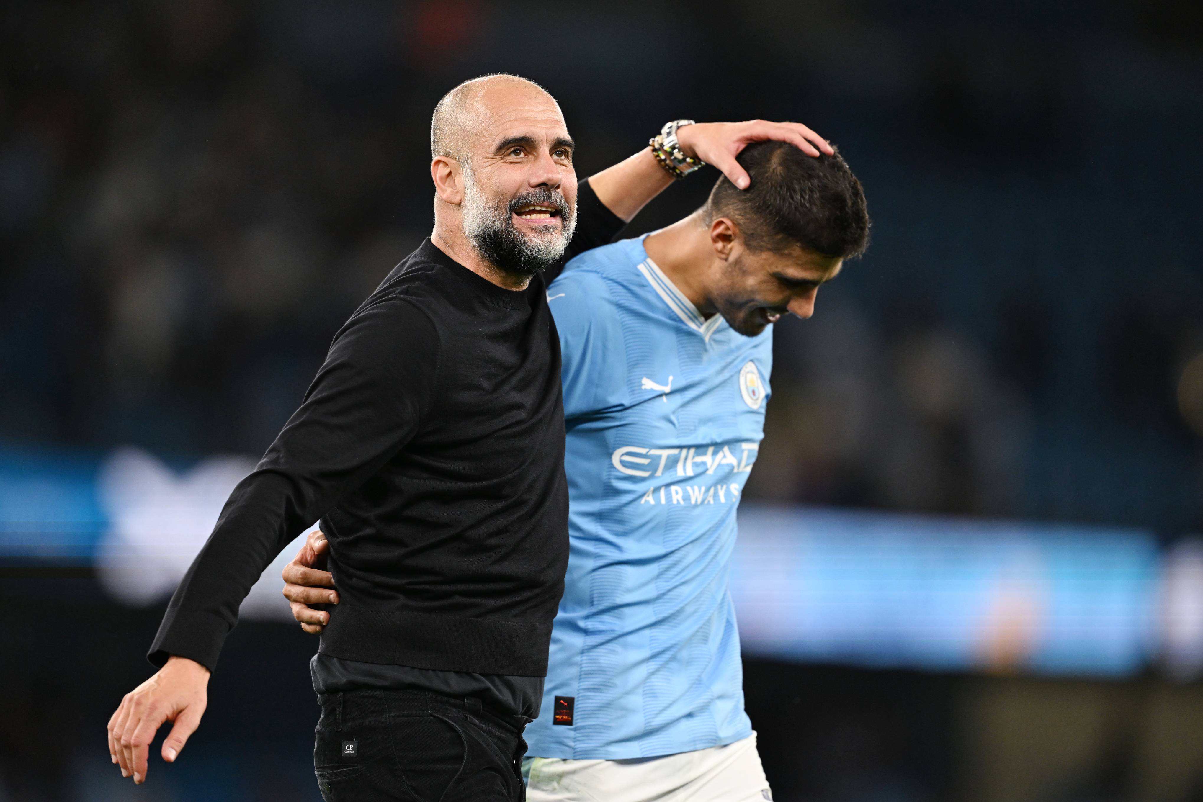 Pep Guardiola and Rodri