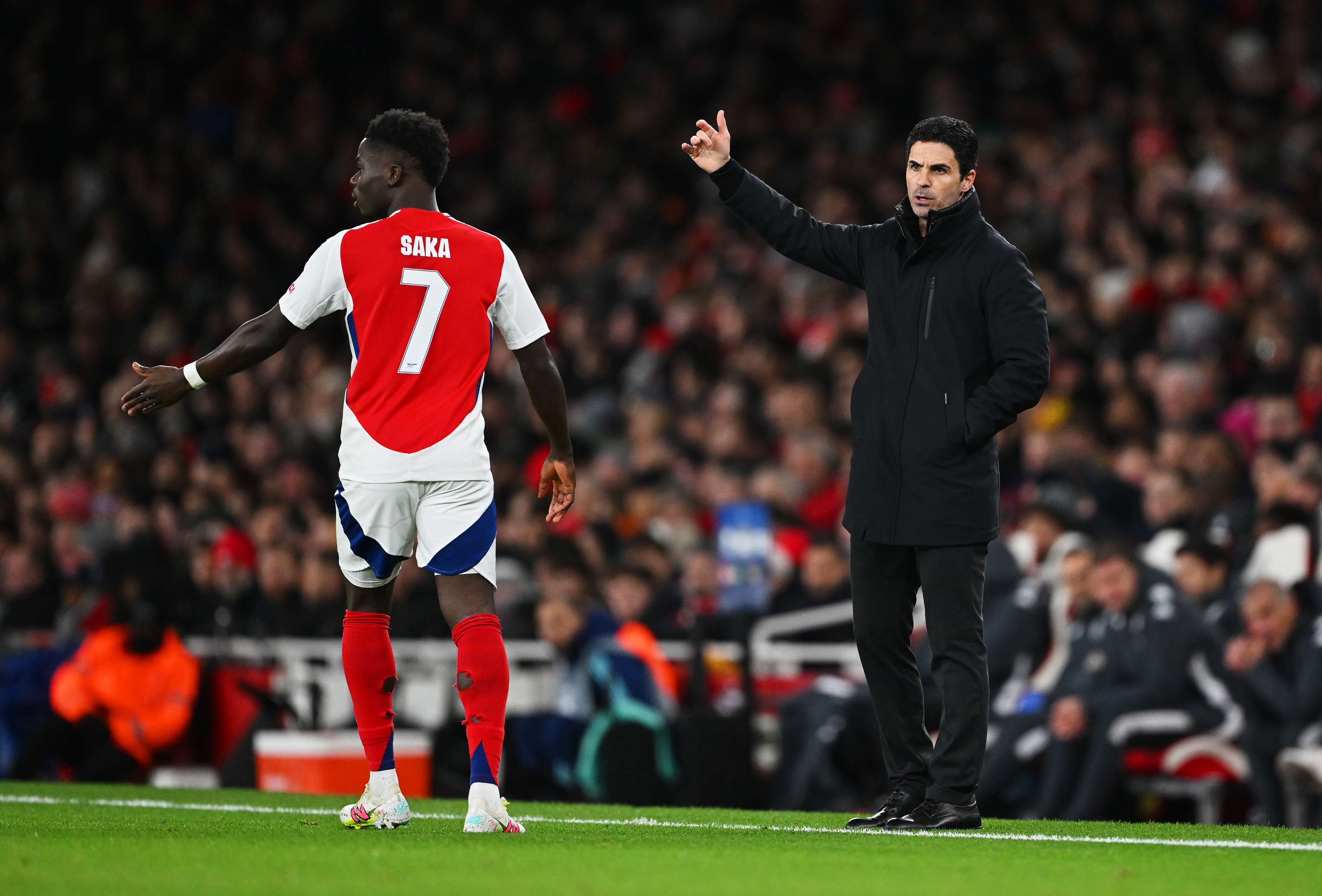 Mikel Arteta and Bukayo Saka