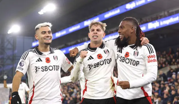 Emile Smith-Rowe celebrates with his Fulham team-mates.