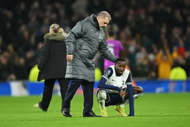 Ange Postecoglou consoles his Spurs players