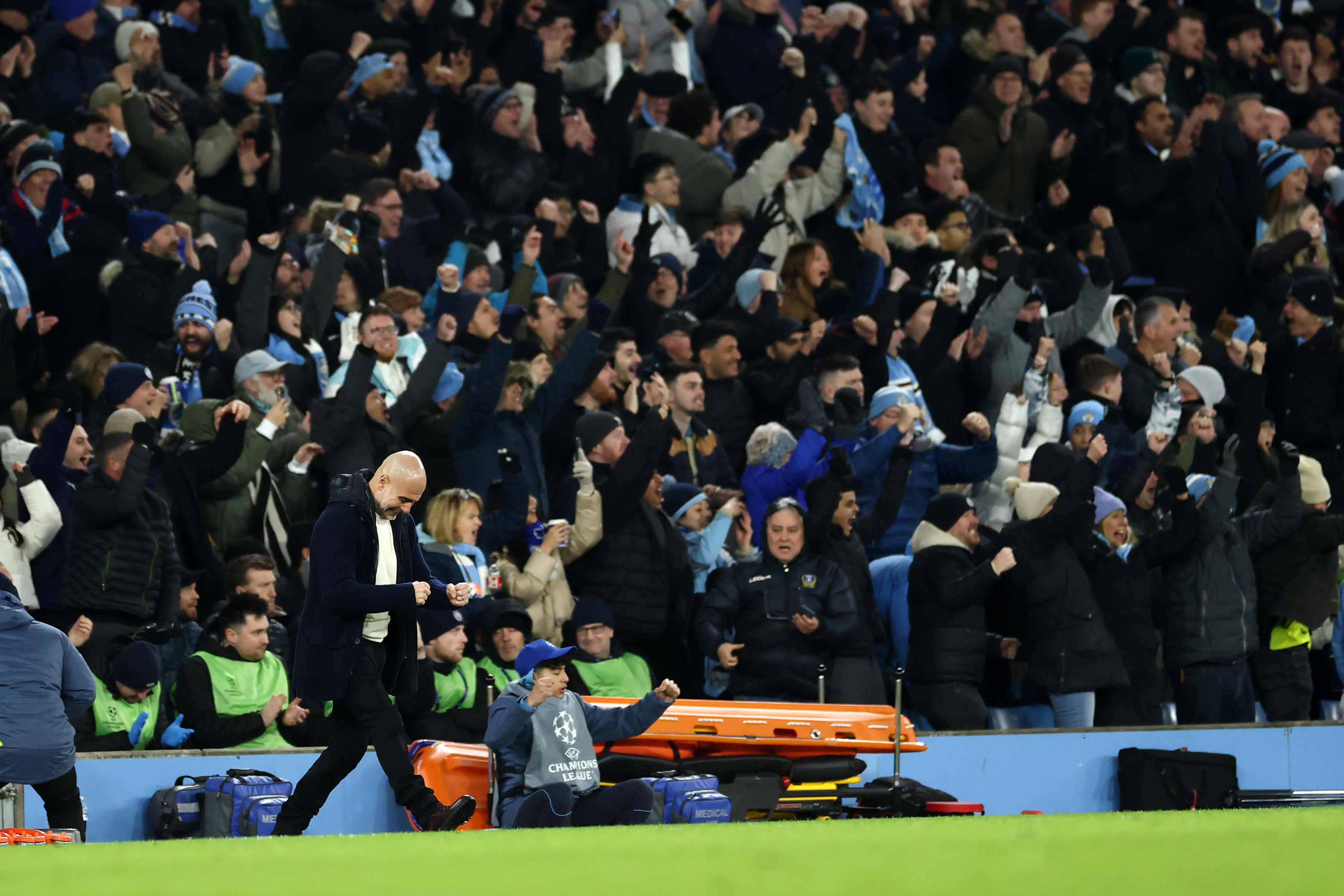 Pep Guardiola celebrates taking the lead against Brugge