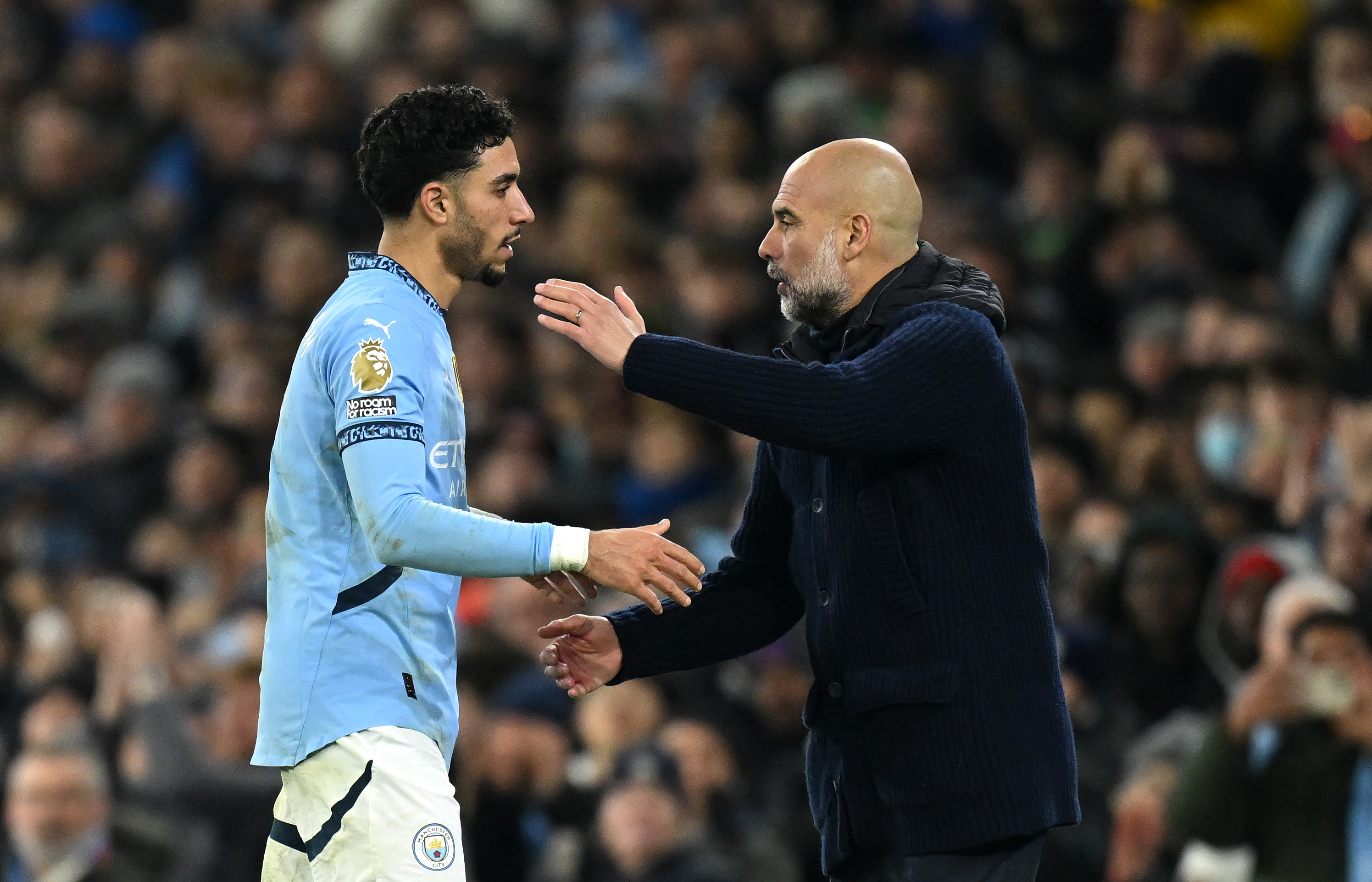 Omar Marmoush and Pep Guardiola