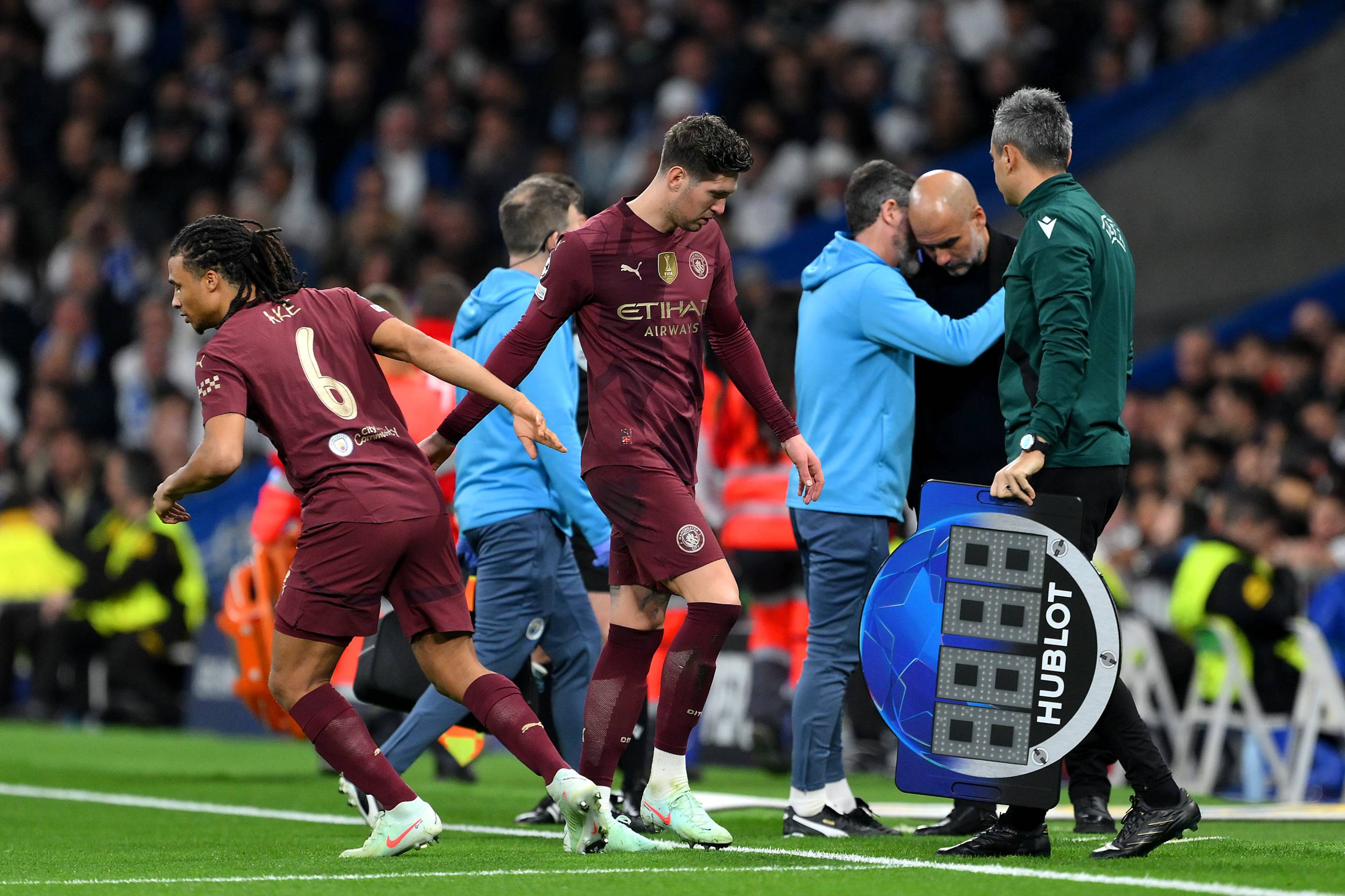 Man City defender John Stones is taken off with an injury