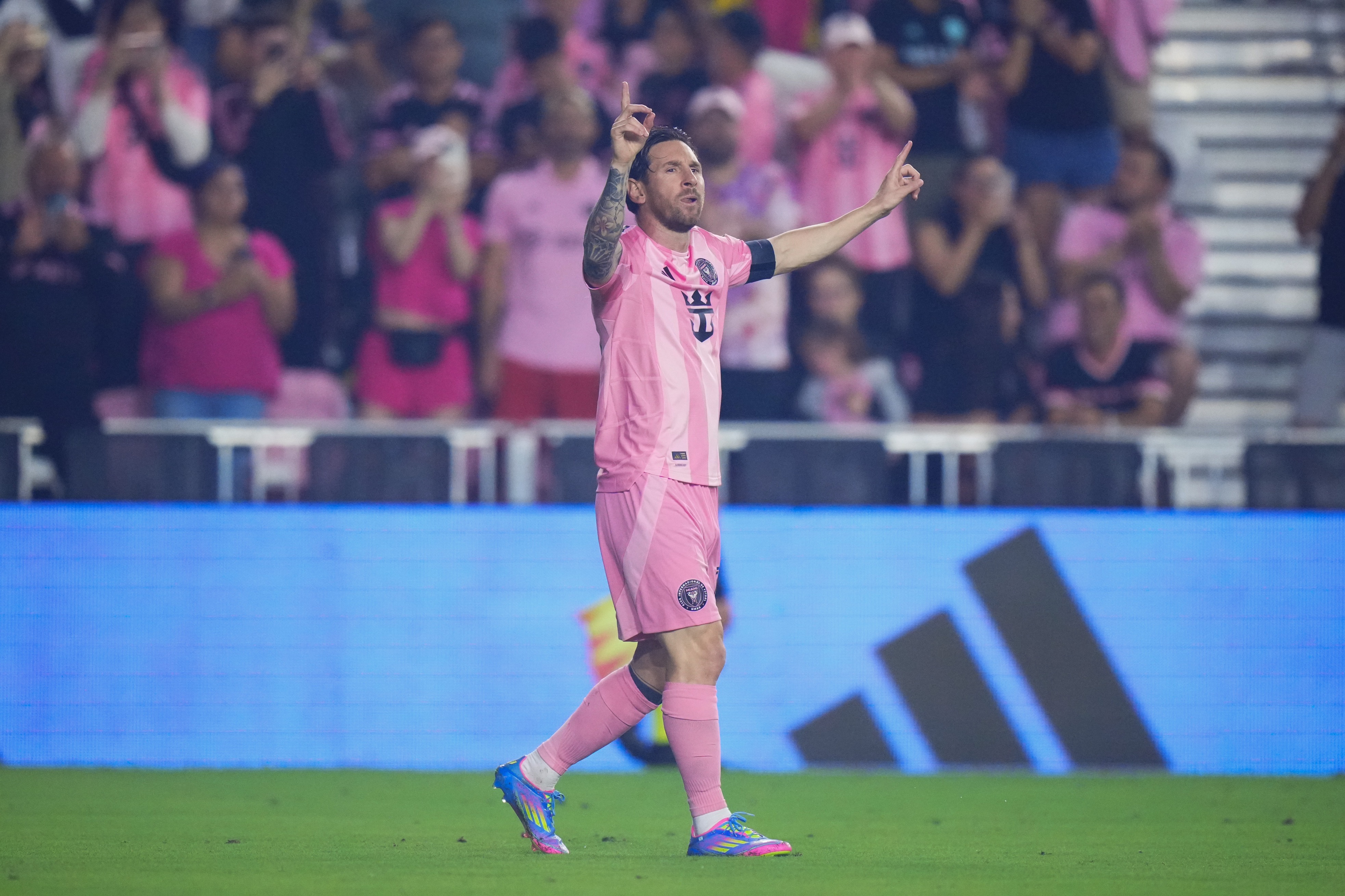 Lionel Messi celebrates scoring for Inter Miami