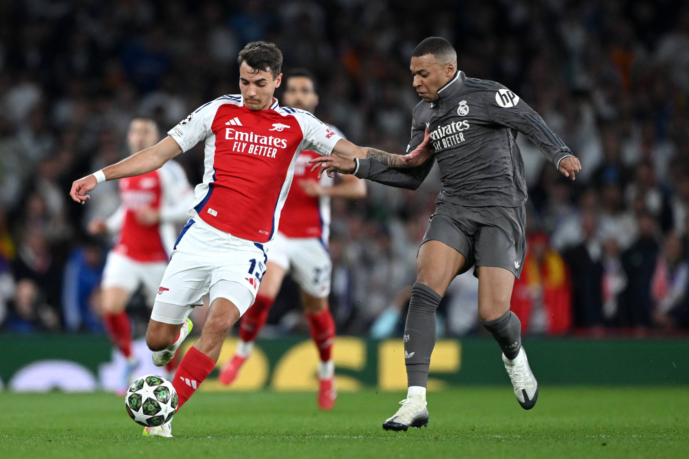 Arsenal defender Jakub Kiwior up against Kylian Mbappe
