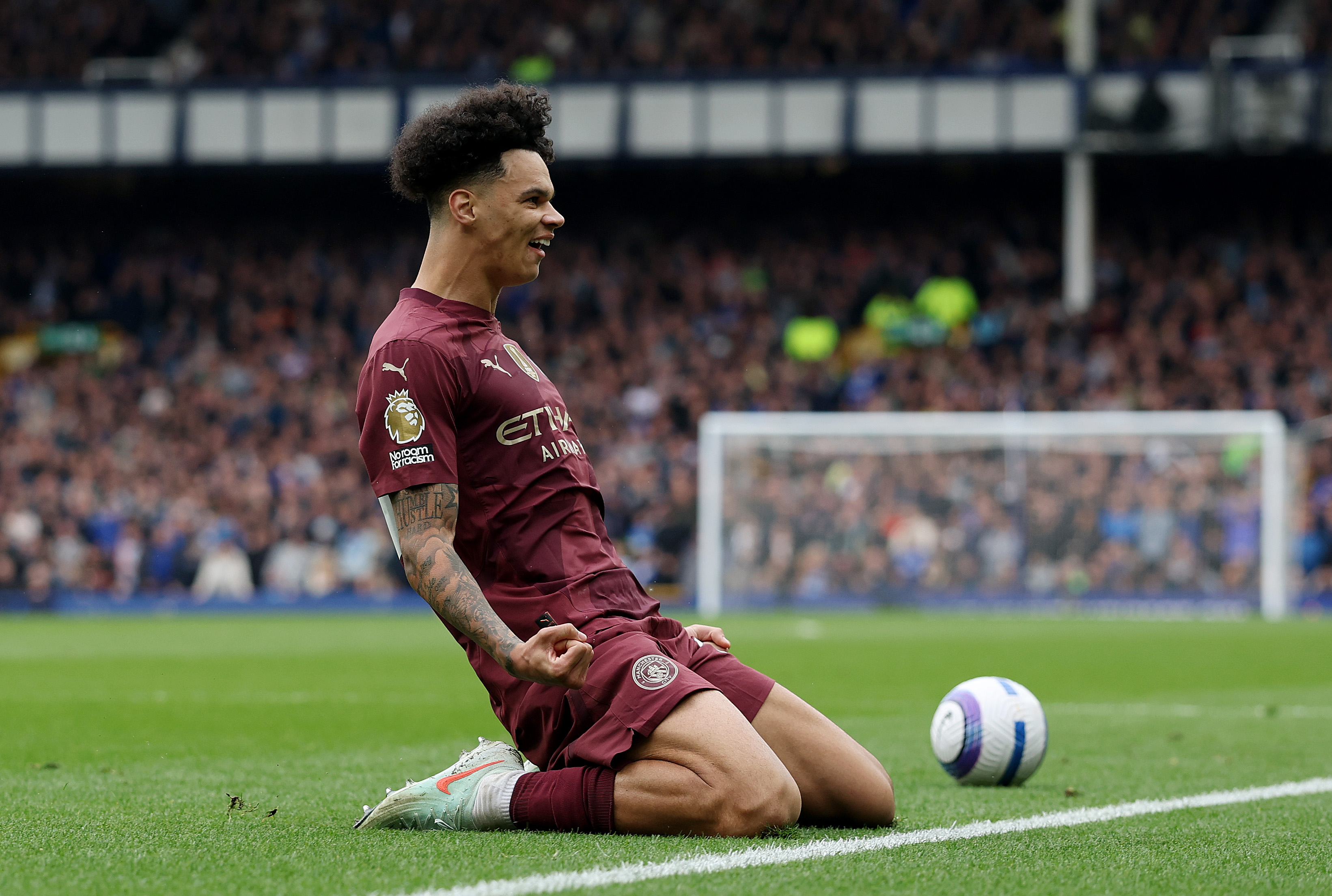 Nico O'Reilly celebrates for Man City