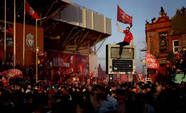 Liverpool fans celebrate their title win
