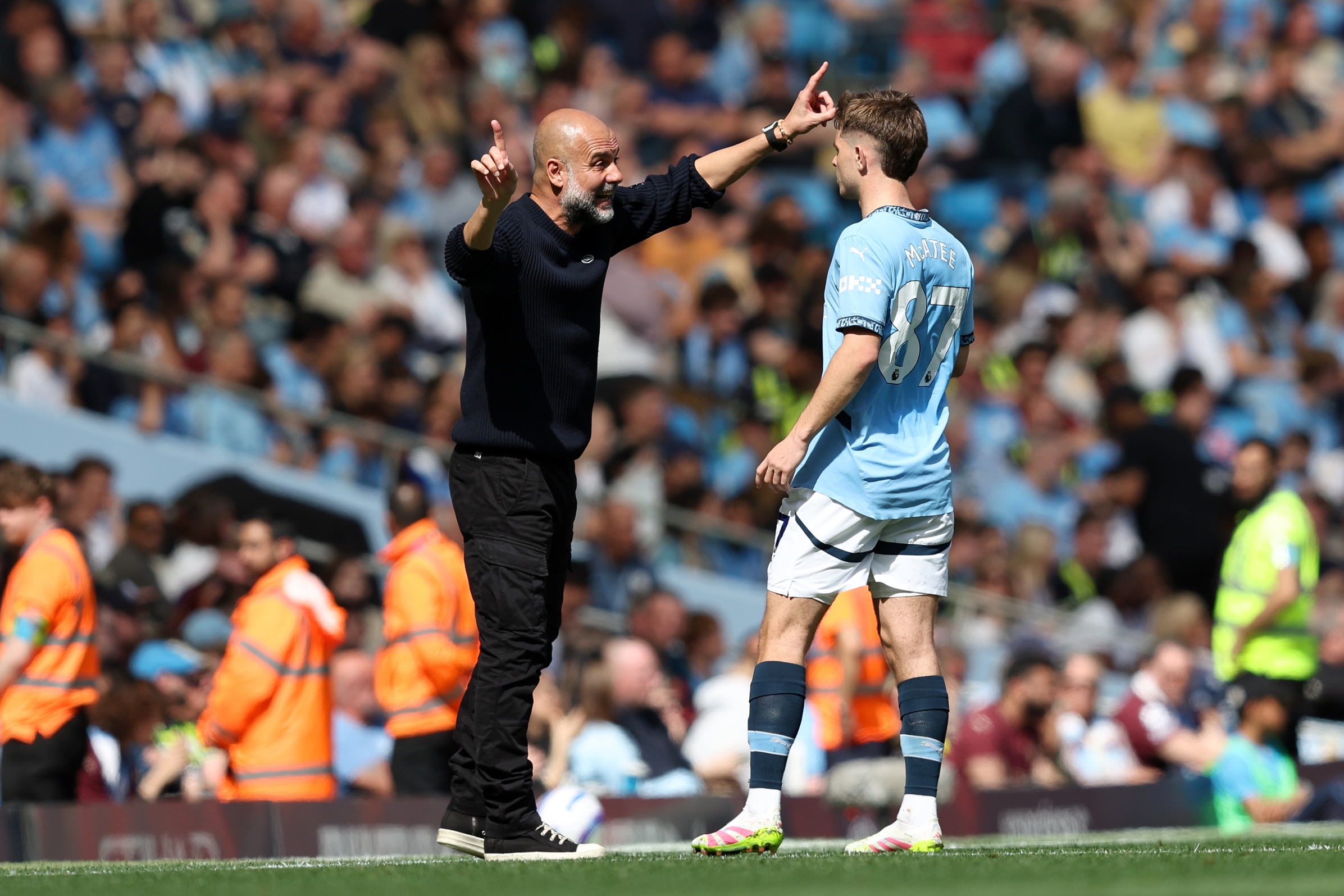 Pep Guardiola and James McAtee