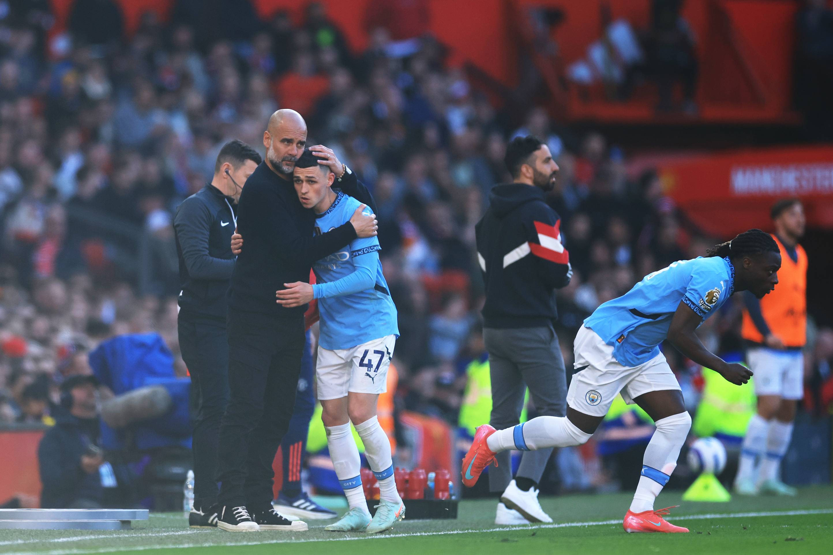Pep Guardiola and Phil Foden