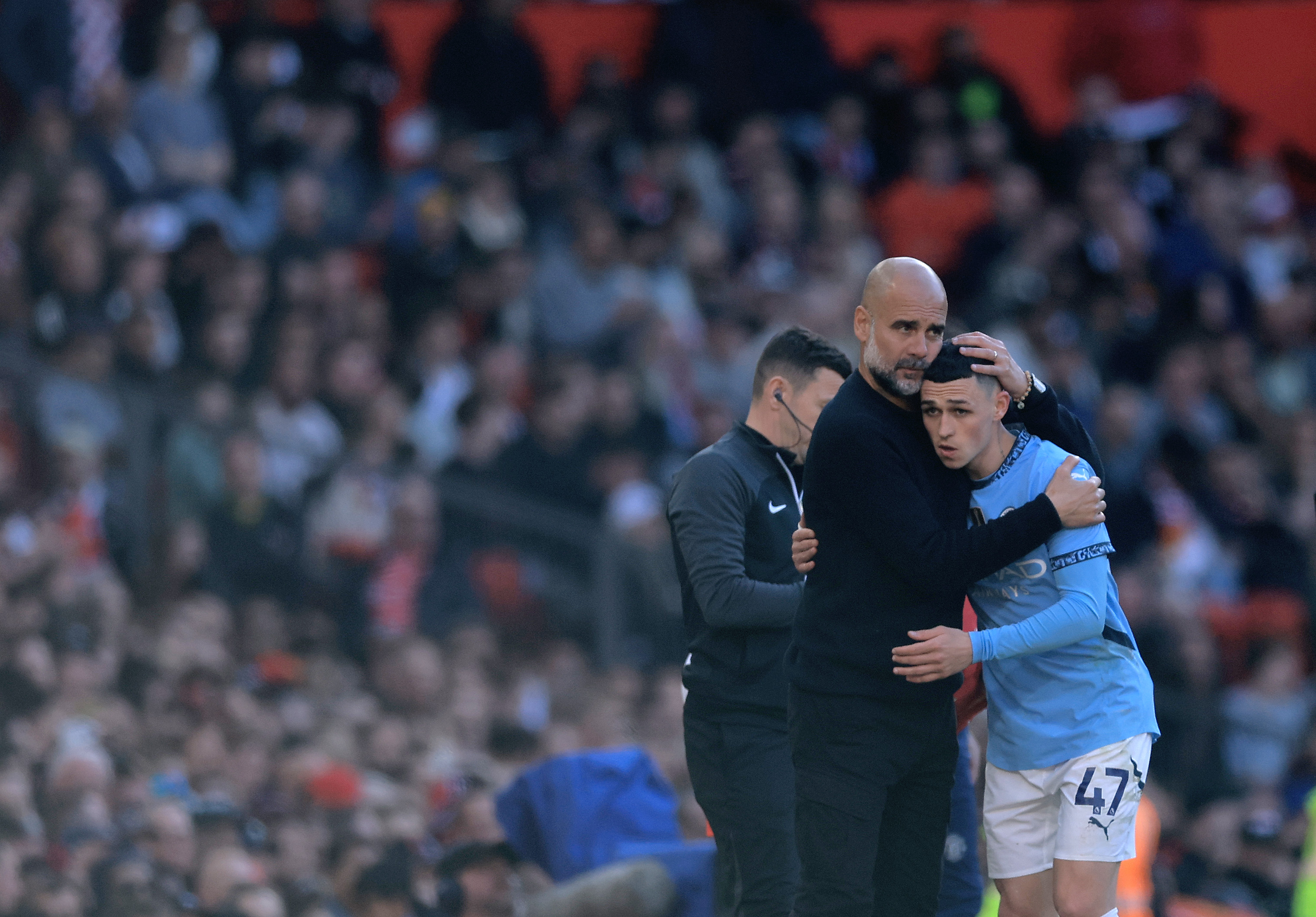 Pep Guardiola and Phil Foden