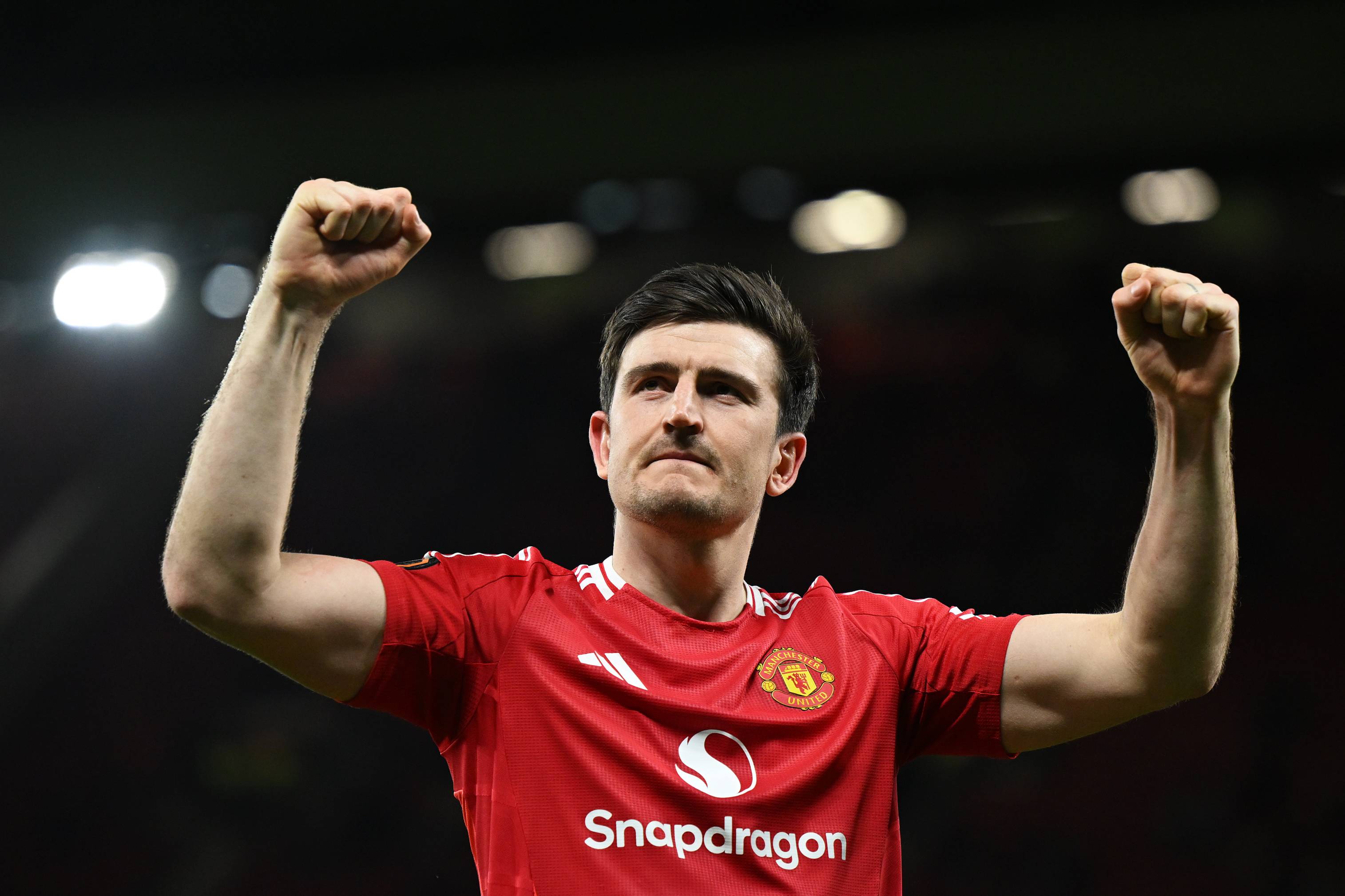 Harry Maguire celebrates against Lyon