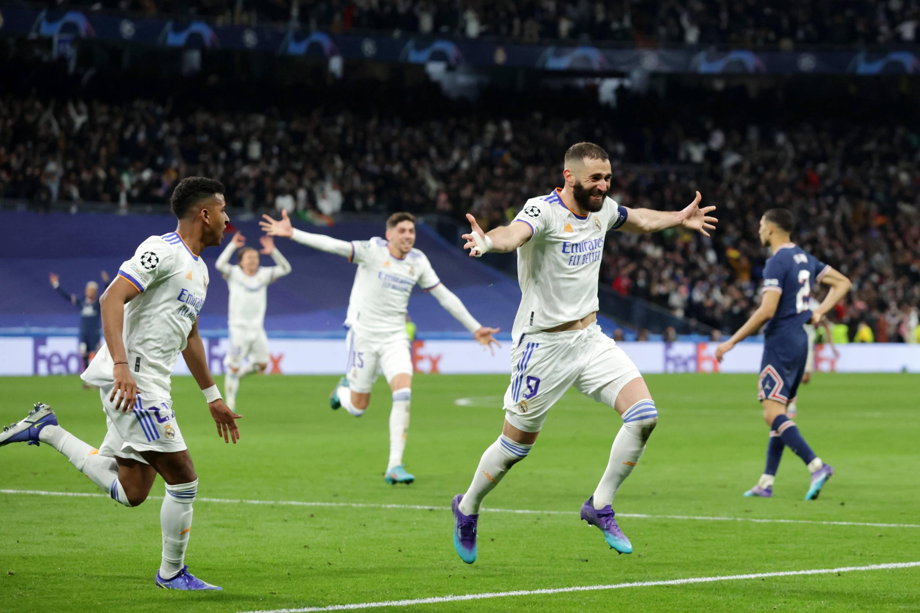 Karim Benzema celebrates scoring against PSG