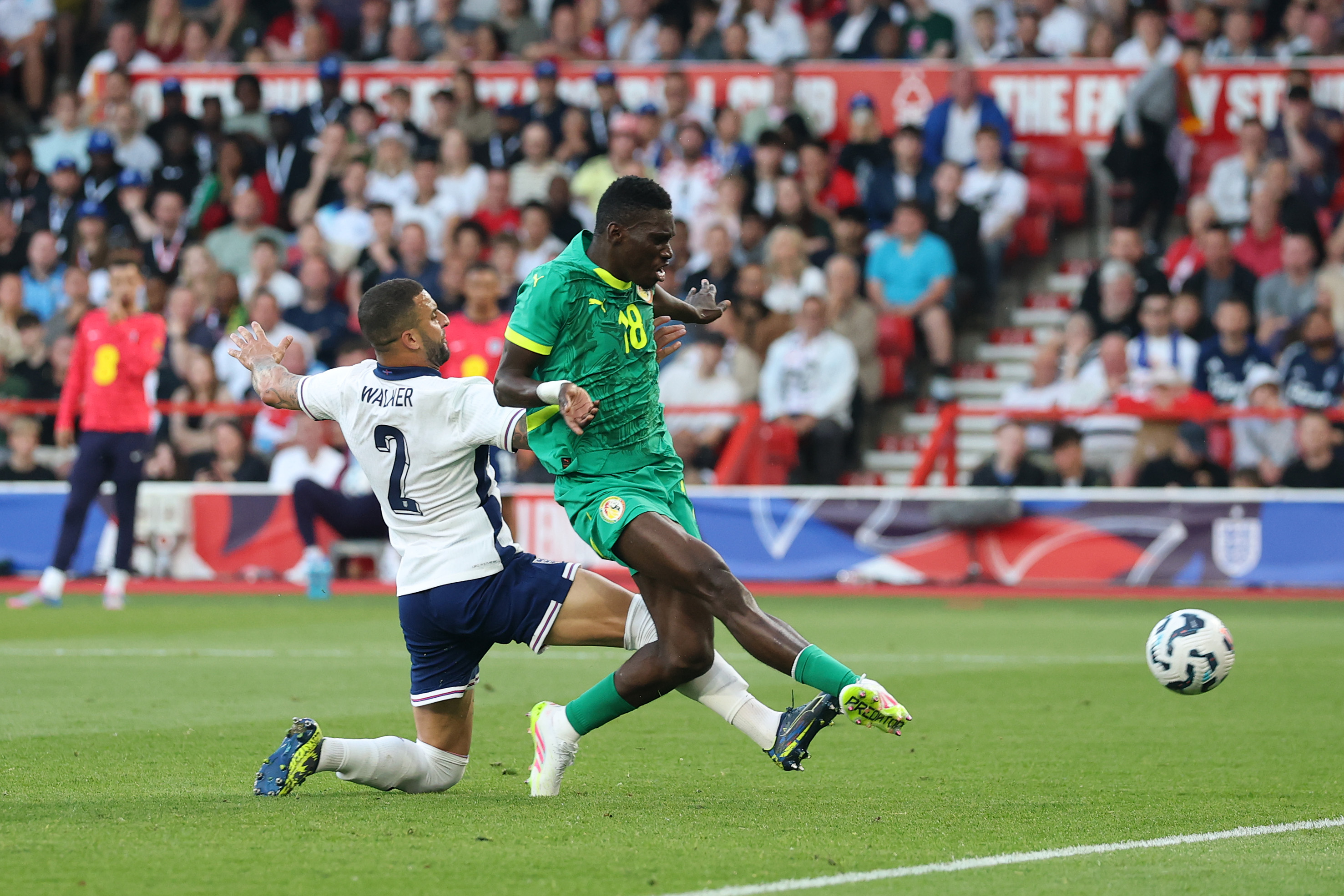 Ismaila Sarr scores against England