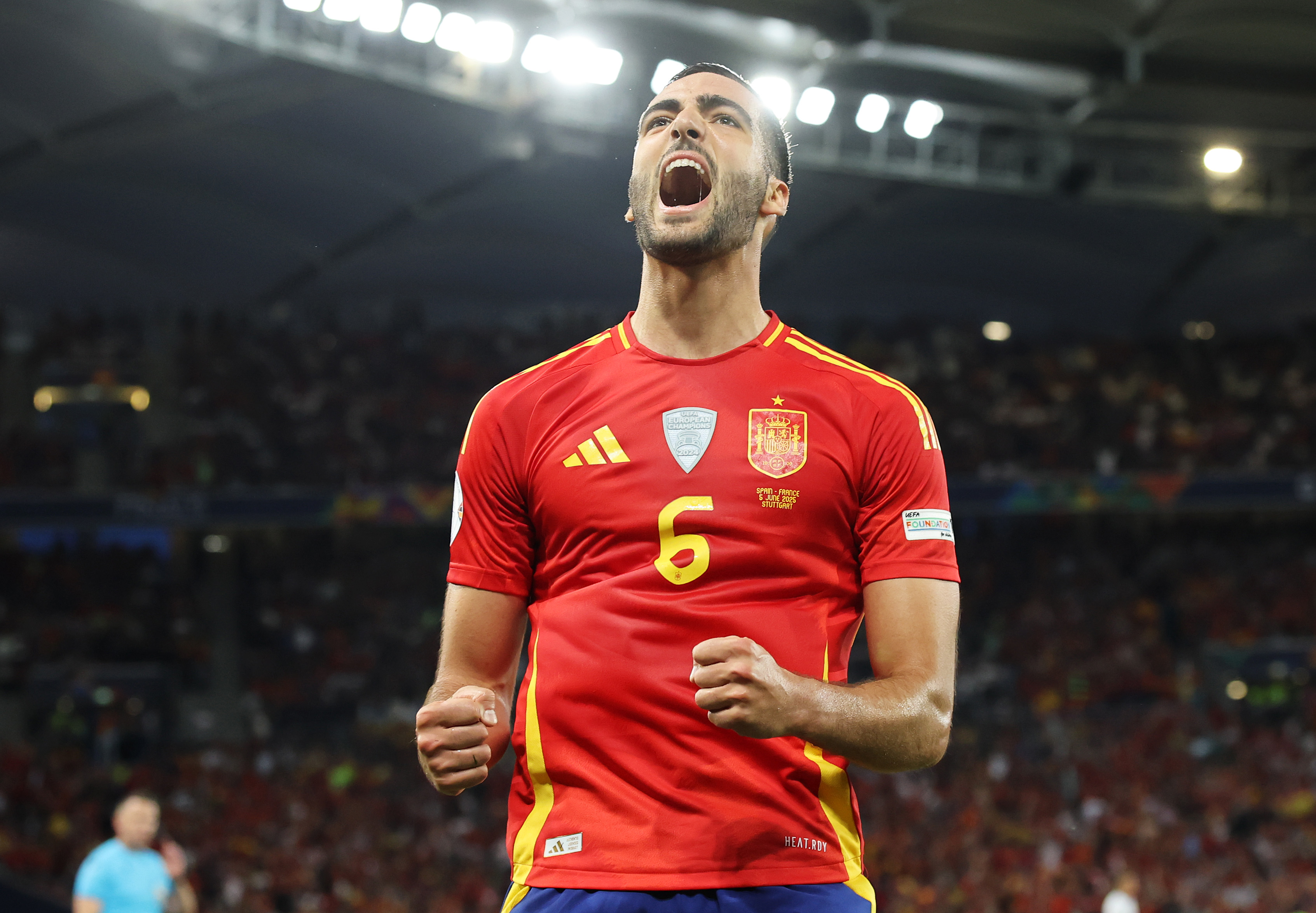 Mikel Merino celebrates for Spain