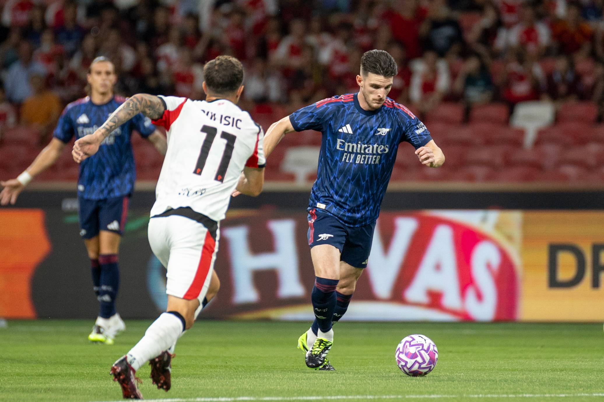 Declan Rice in action against AC Milan