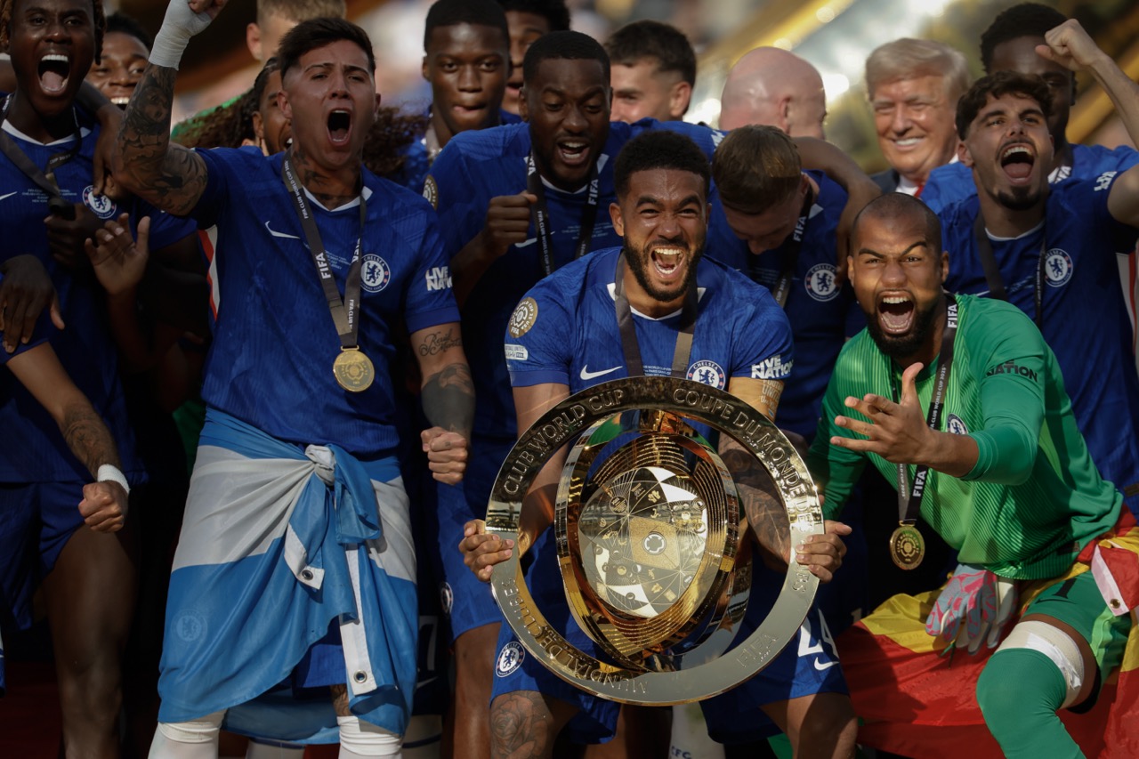 Reece James celebrates with the FIFA Club World Cup trophy with Robert Sanchez (Photo by Chip Somodevilla/Getty Images) via ONE FOOTBALL