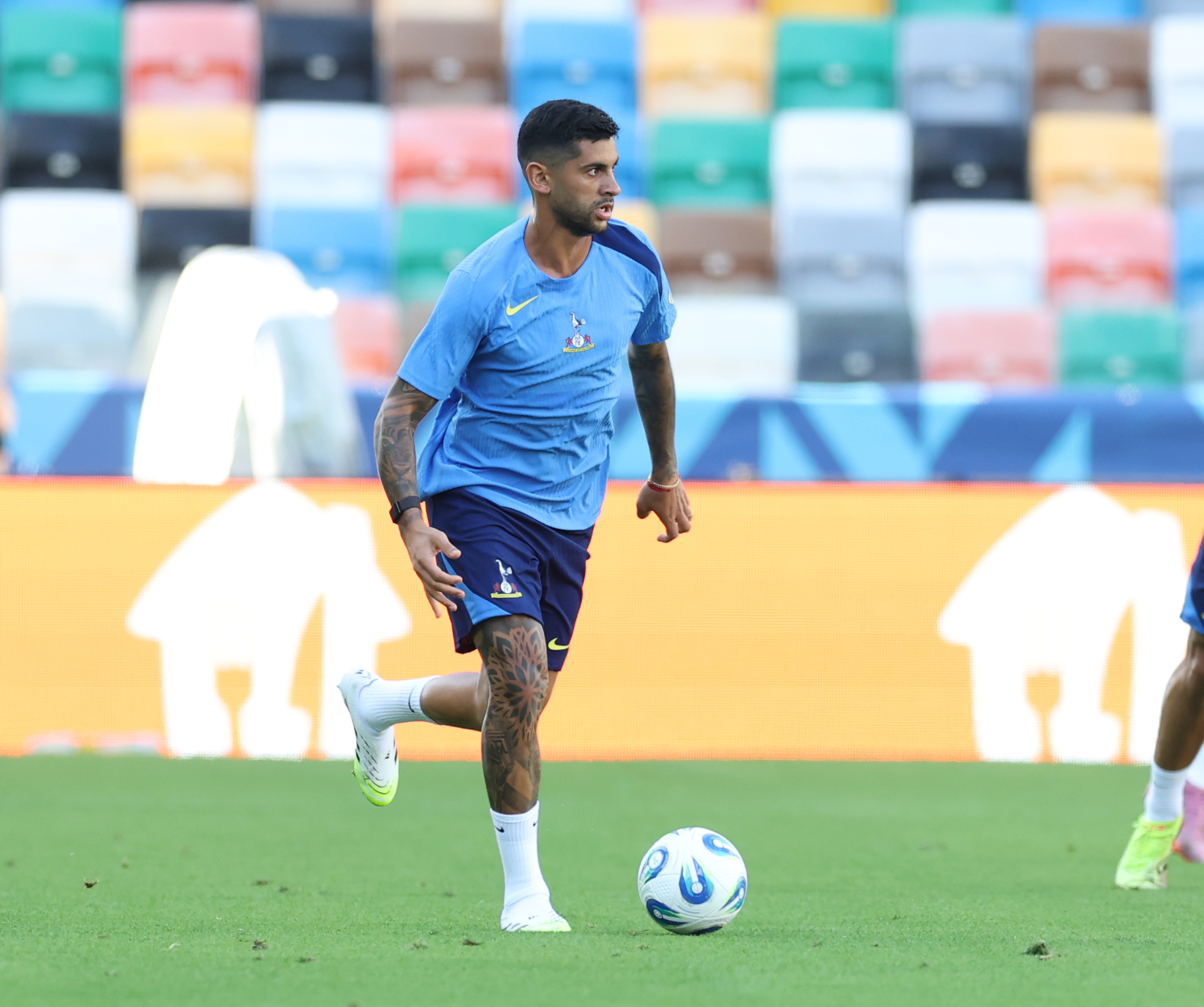 Cristian Romero training with Spurs