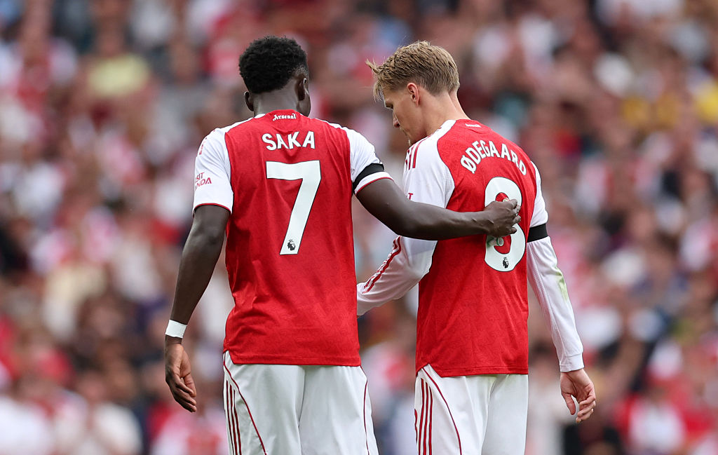 Saka and Odegaard (Photo by Julian Finney/Getty Images)