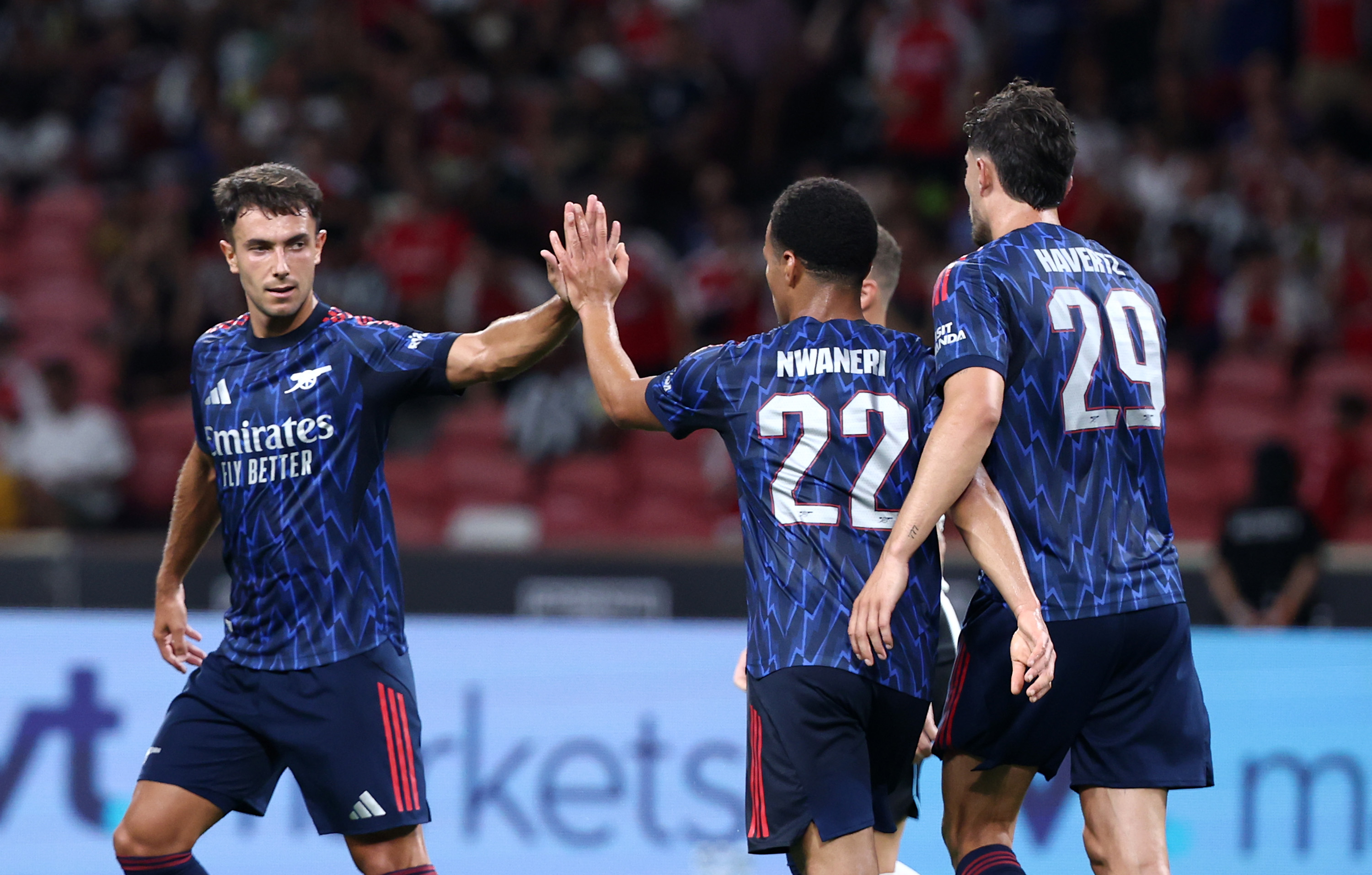 Arsenal's Ethan Nwaneri celebrates with team-mates