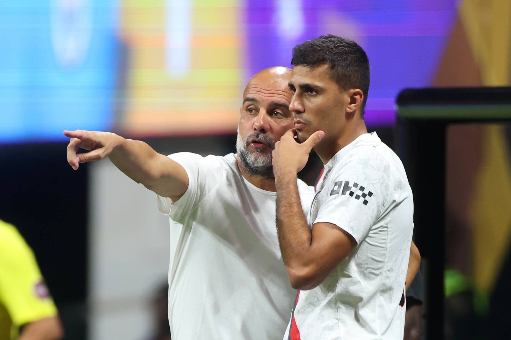 Pep Guardiola and Rodri