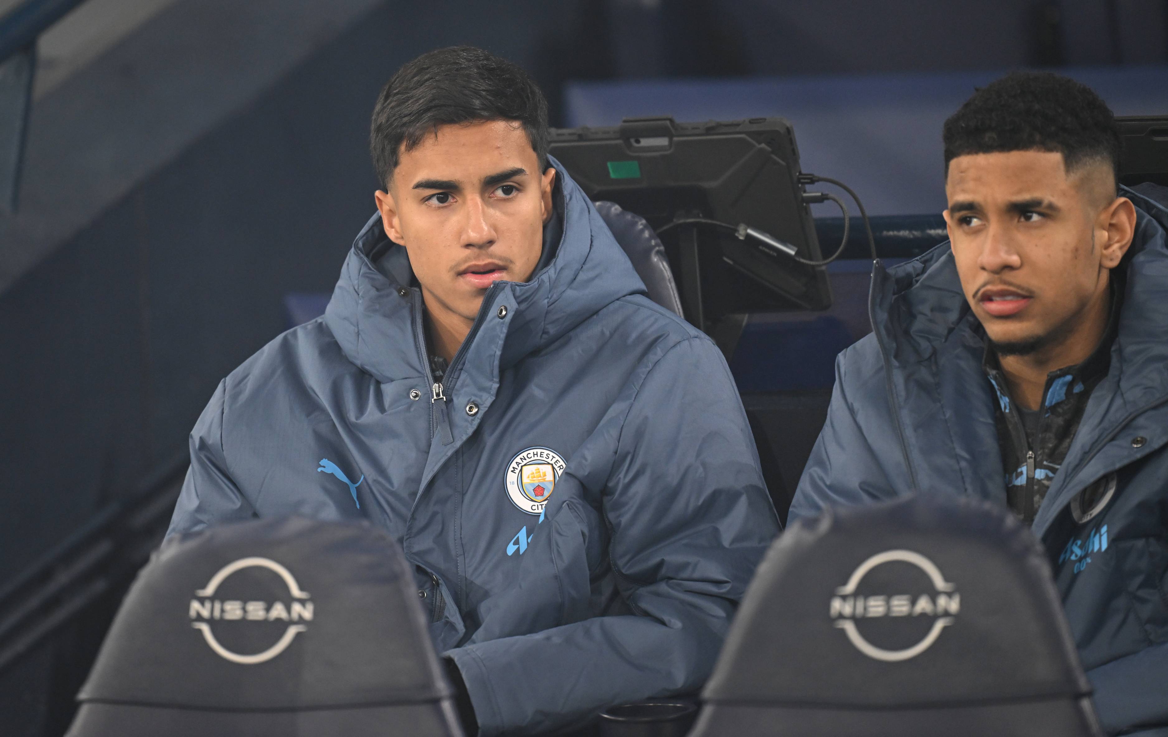 Man City defender Vitor Reis, pictured left