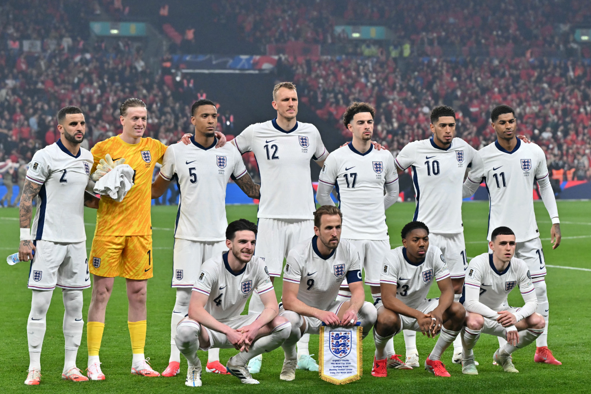 England's team (Photo by GLYN KIRK/AFP via Getty Images)