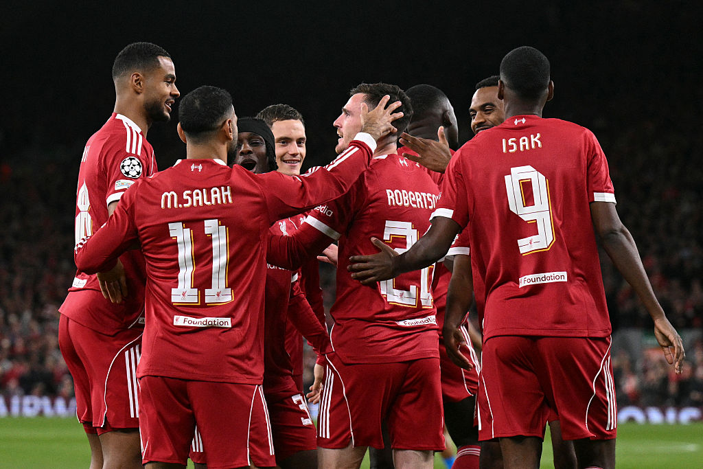 Andy Robertson celebrates with his Liverpool team-mates