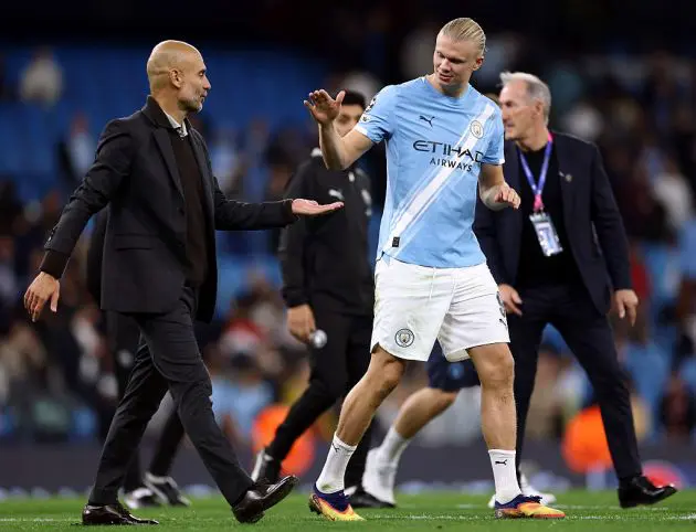 Pep Guardiola and Erling Haaland