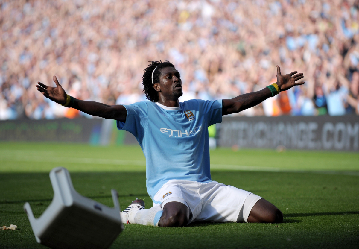 Emmanuel Adebayor celebrates against Arsenal (Photo by Shaun Botterill/Getty Images)
