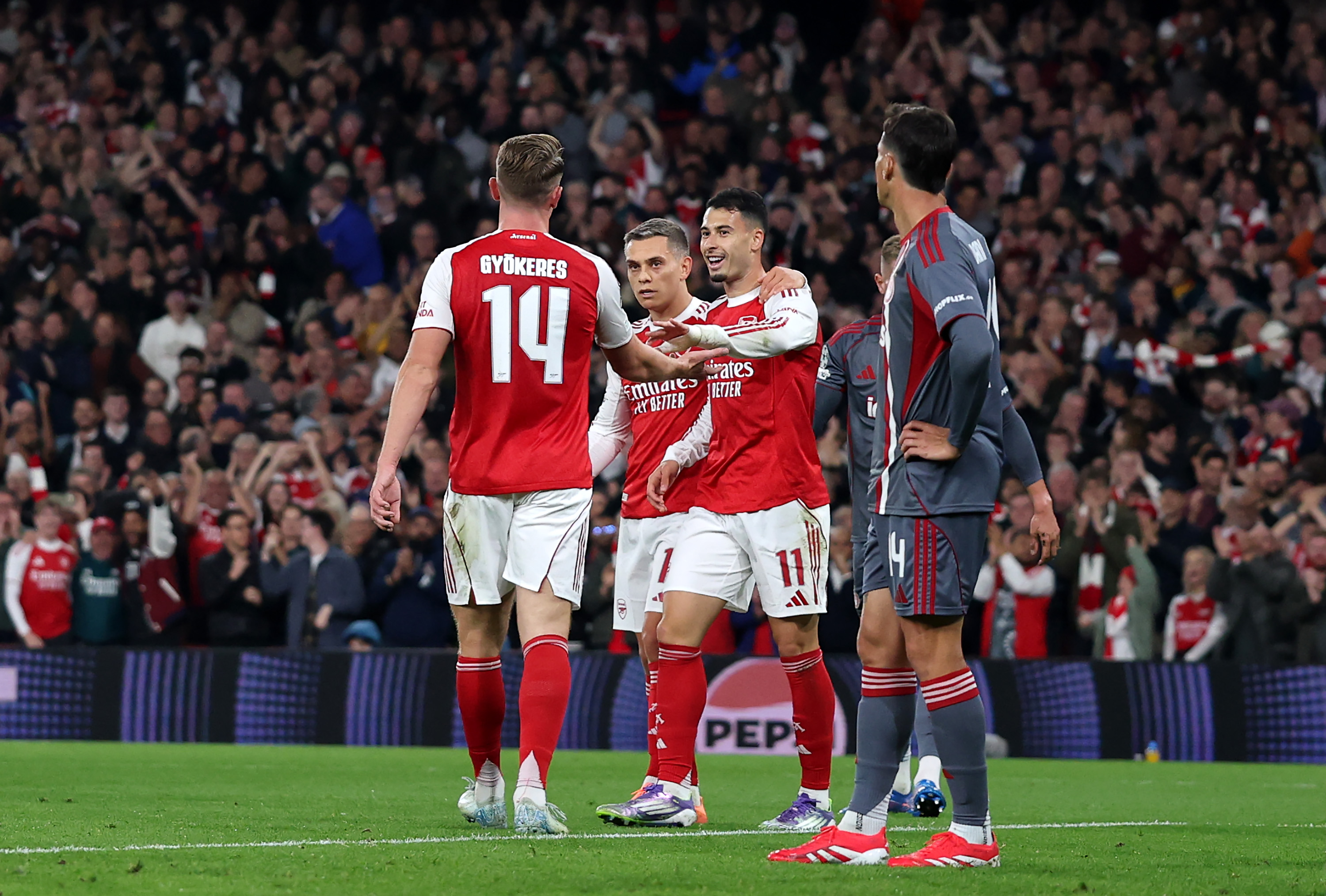 Arsenal celebrate against Olympiacos