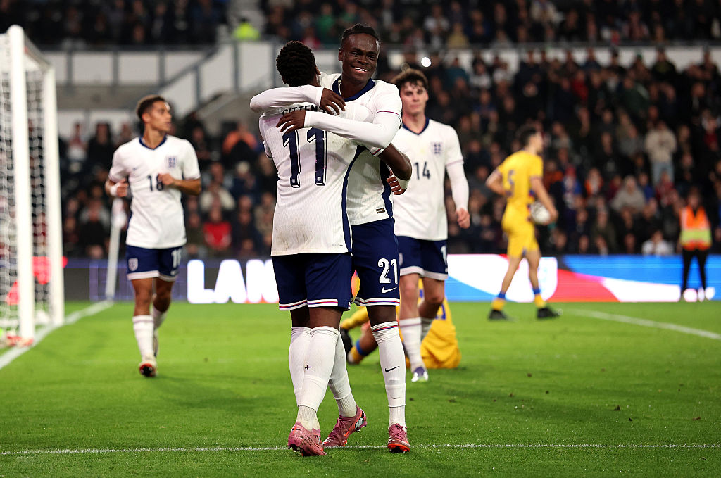 Tyrique George and Jamie Gittens celebrate