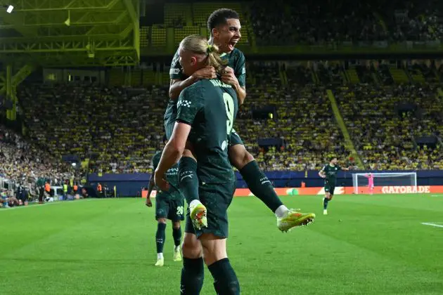 Erling Haaland and Rico Lewis celebrate (Photo by JAVIER SORIANO/AFP via Getty Images)