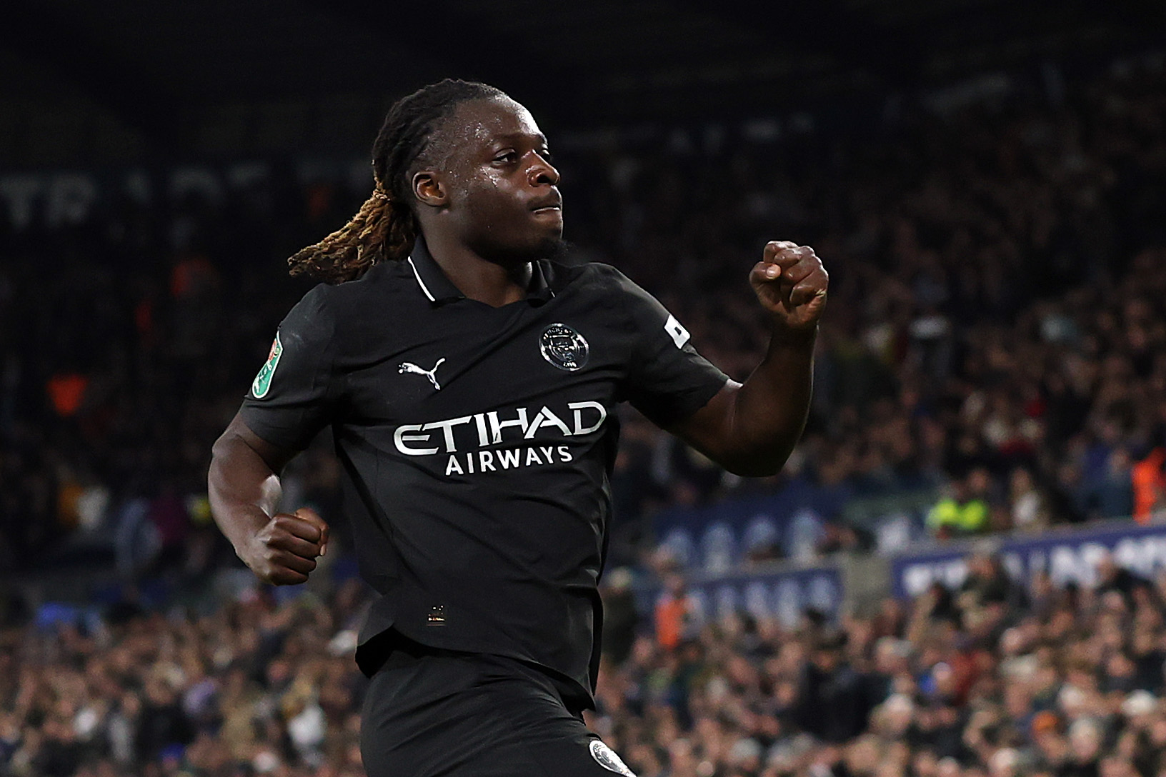 Jeremy Doku celebrates his equaliser