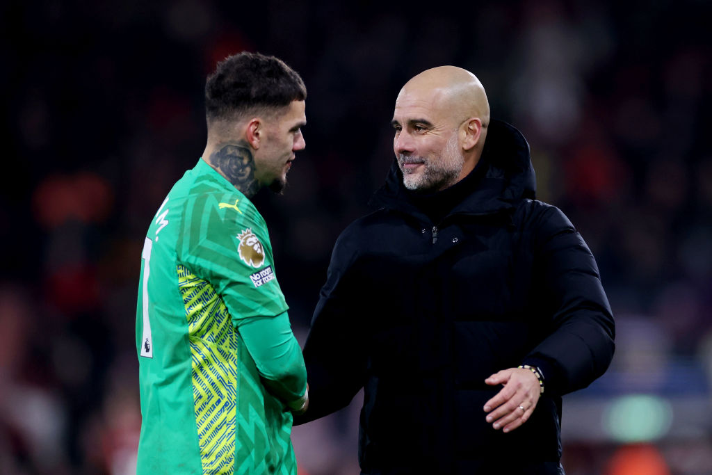 Ederson with Pep Guardiola