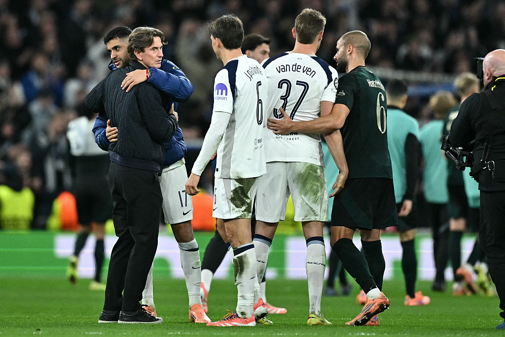 Spurs boss Thomas Frank celebrates with his players