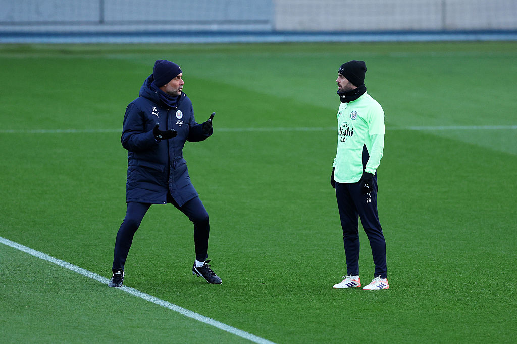 Pep Guardiola and Bernardo Silva