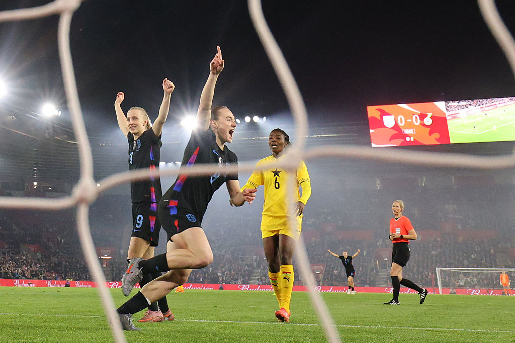 Lucia Kendall celebrates scoring for England