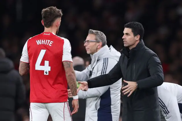 Ben White goes off injured against Wolves