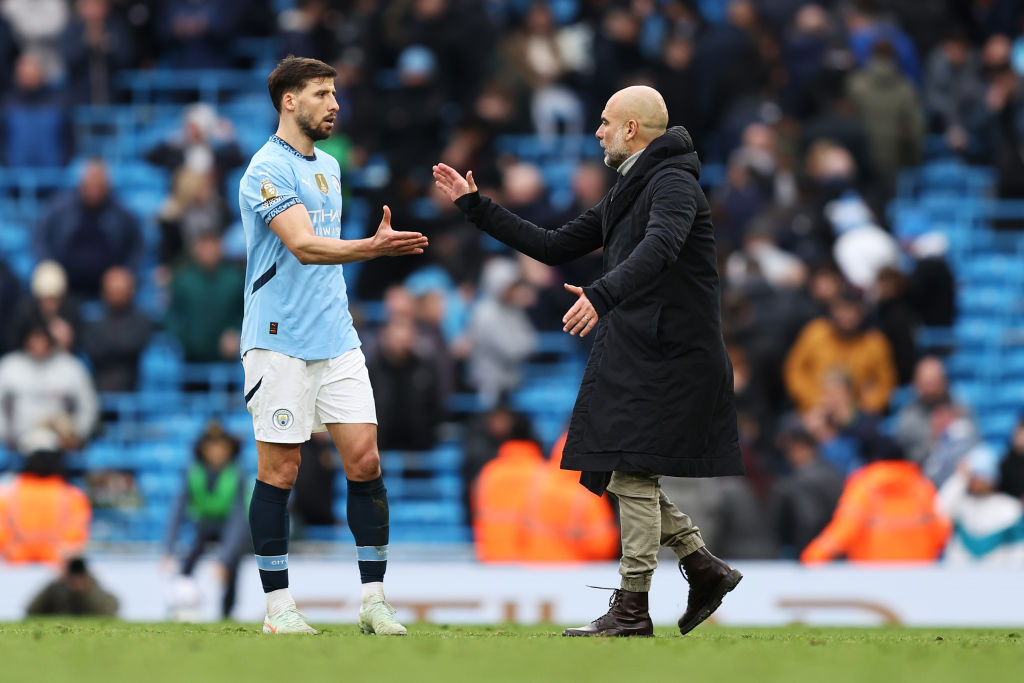 Ruben Dias and Pep Guardiola