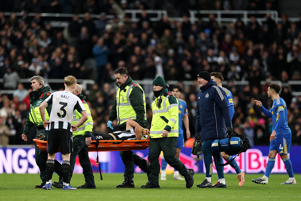 Fabian Schar is stretchered off for Newcastle