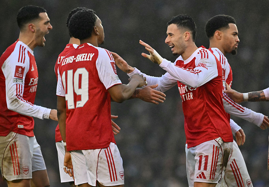 Arsenal celebrate against Portsmouth