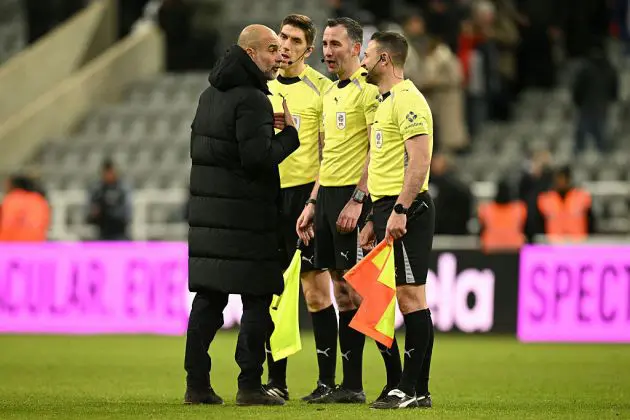 Pep Guardiola speaking to the officials
