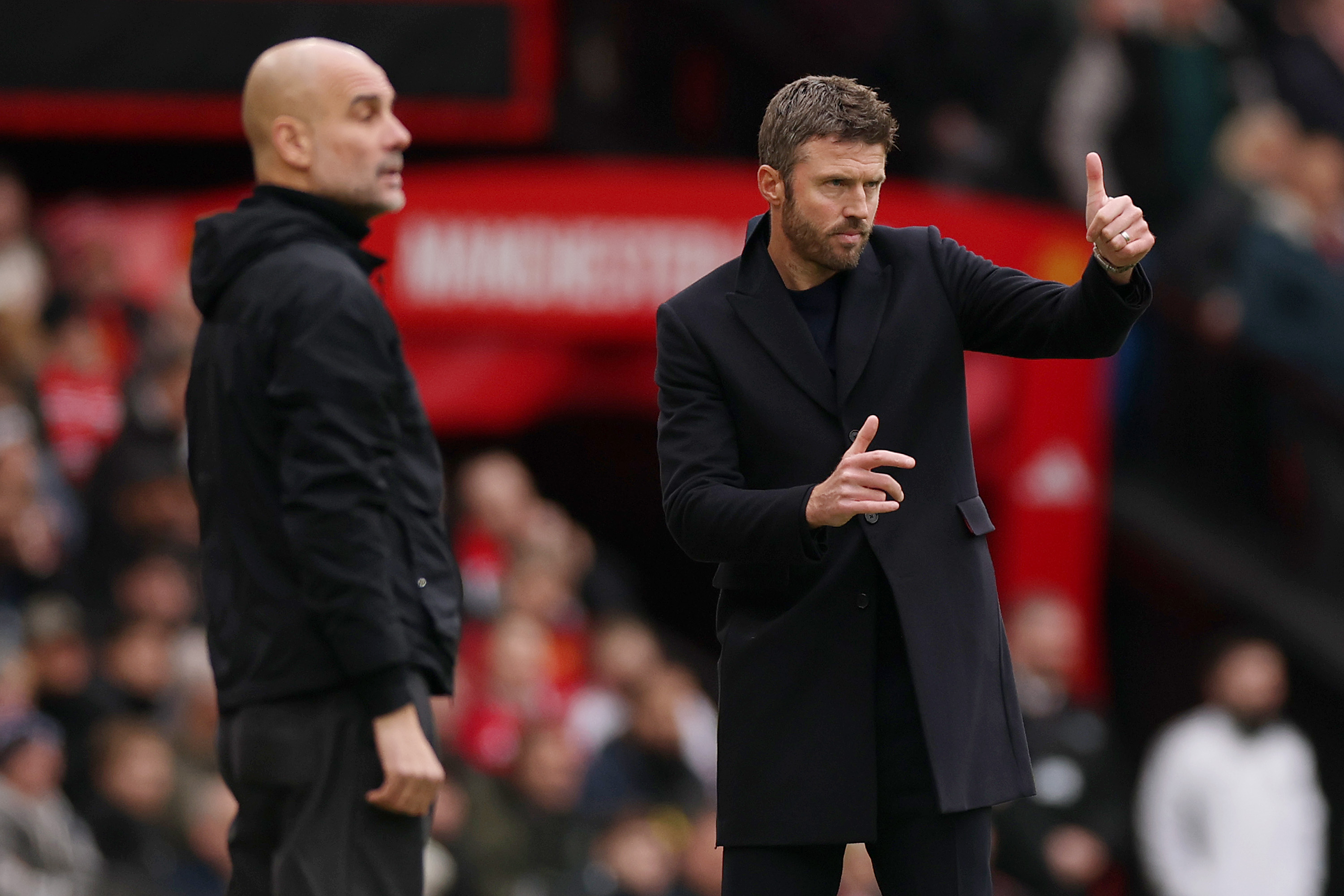 Pep Guardiola and Michael Carrick