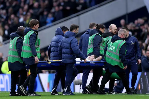 Ben Davies is taken off on a stretcher