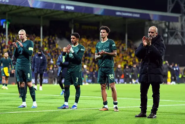 Pep Guardiola and his players applaud the Man City fans