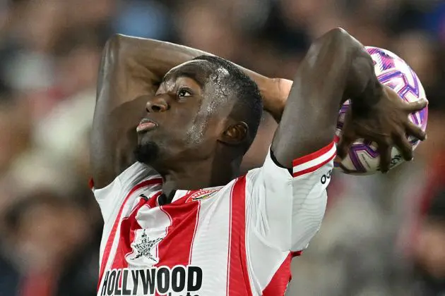 Michael Kayode throwing the ball