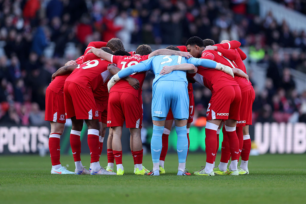 The Middlesbrough team huddle together